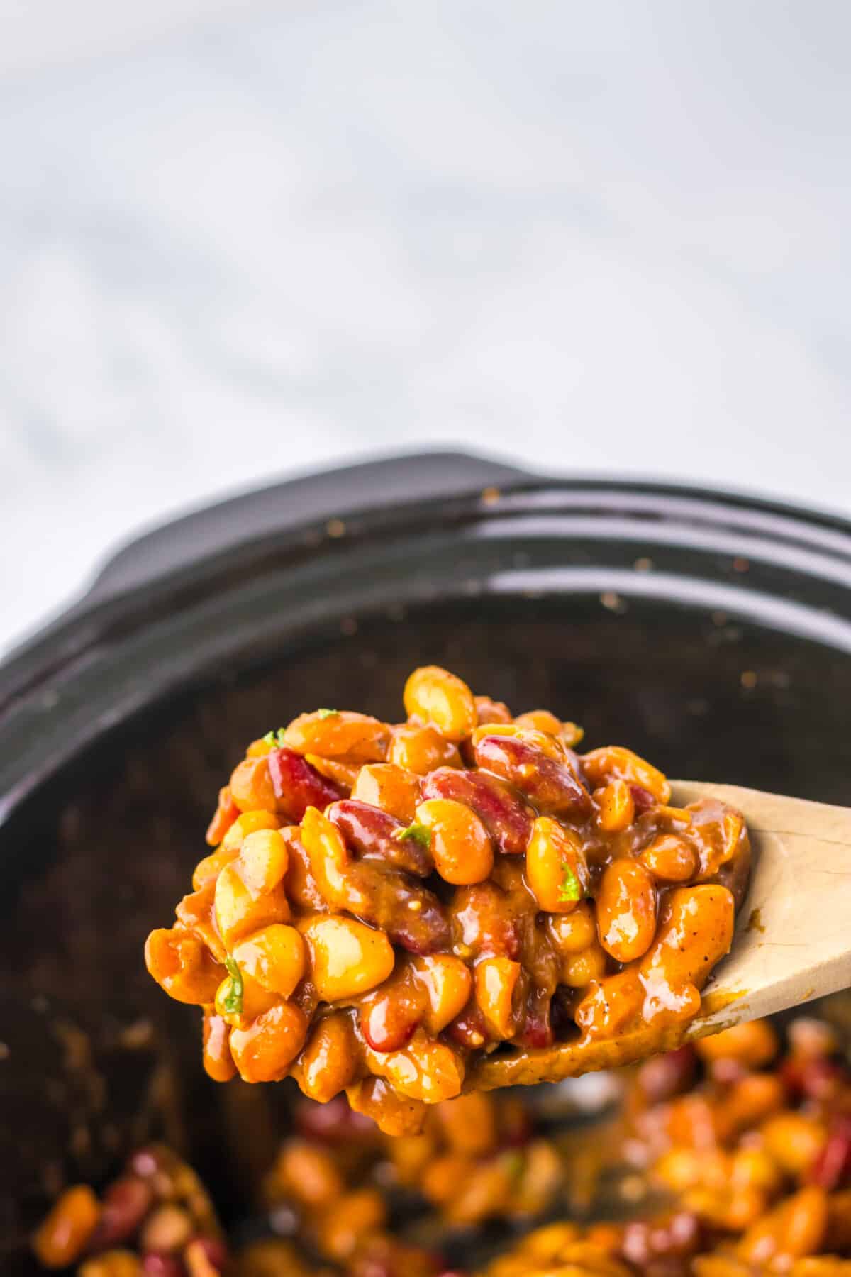 Slow cooker Dr Pepper baked beans thick and fully cooked.