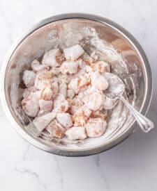 Chicken coated in cornstarch for jalapeno chicken recipe.