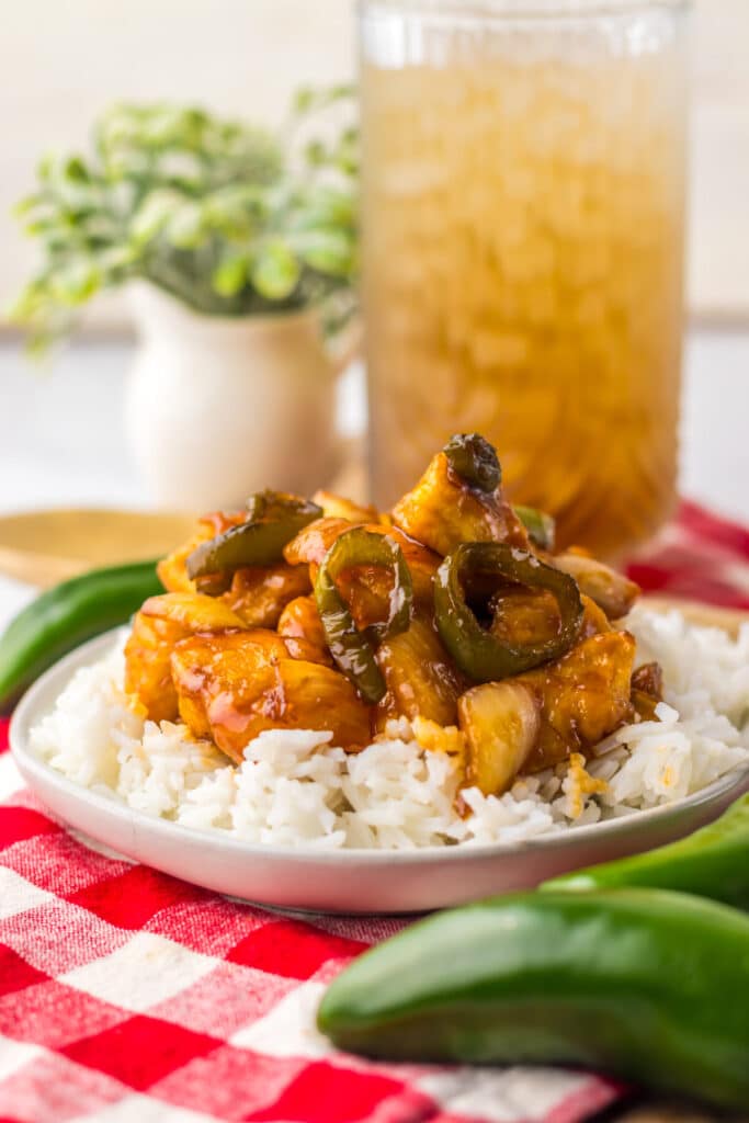 Close-up of spicy jalapeno chicken over rice.