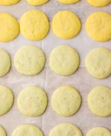 Fresh baked lemon lime meltaway cookies on a baking sheet.
