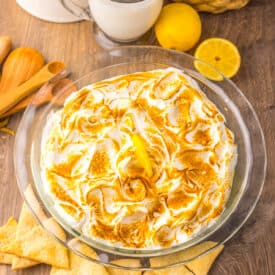 Close-up of creamy lemon dip with fluffy toasted meringue.