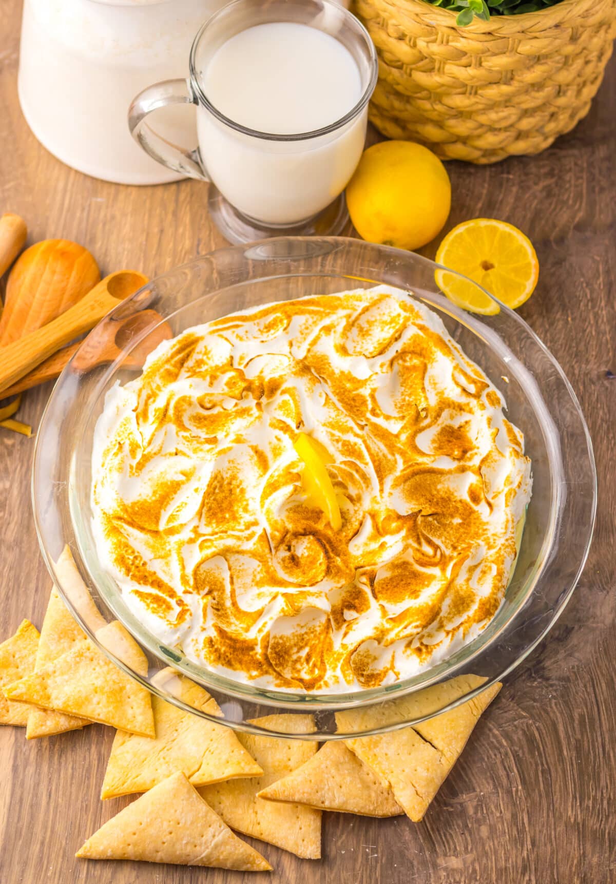 Close-up of creamy lemon dip with fluffy toasted meringue.