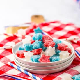 Bright colored gumdrops in red, white, and blue for a festive treat.