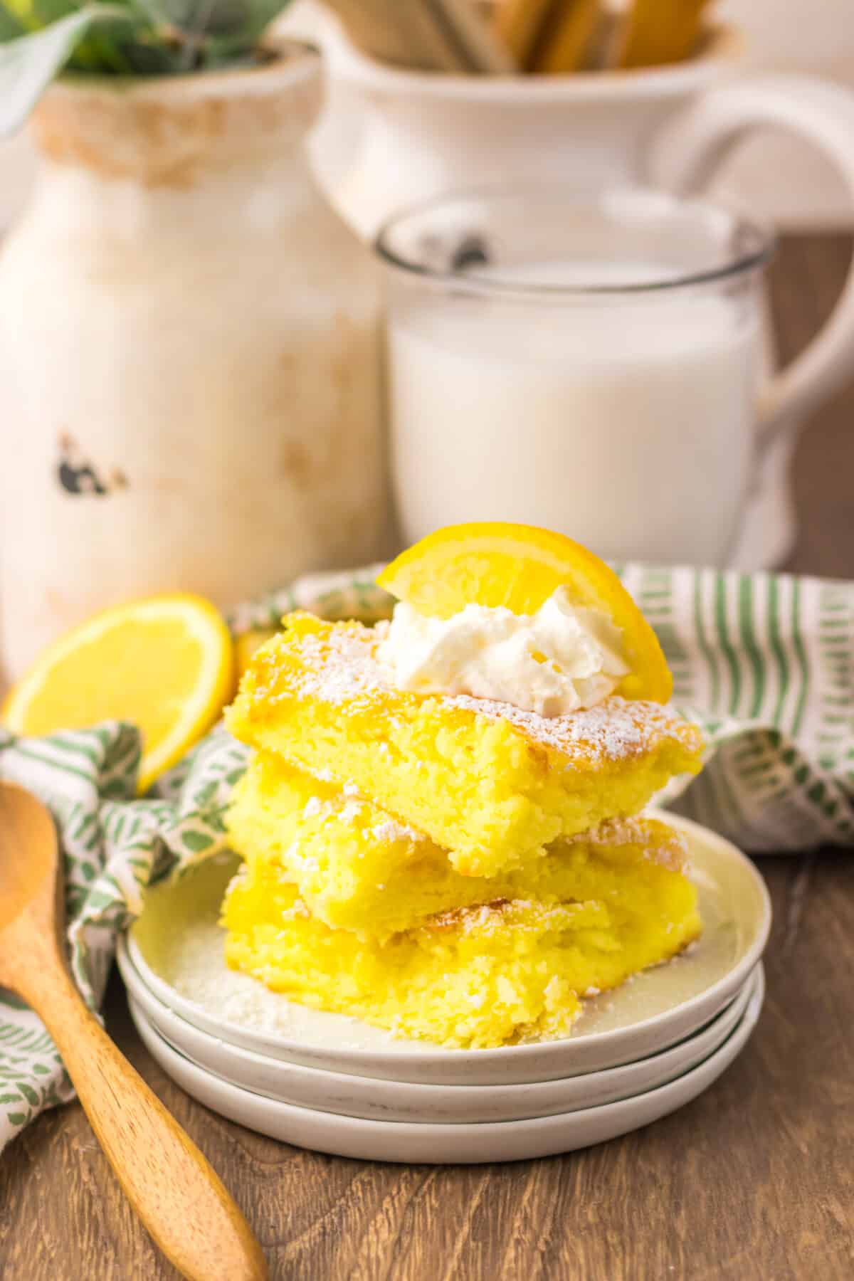 Stack of two ingredient lemon bars on a plate.