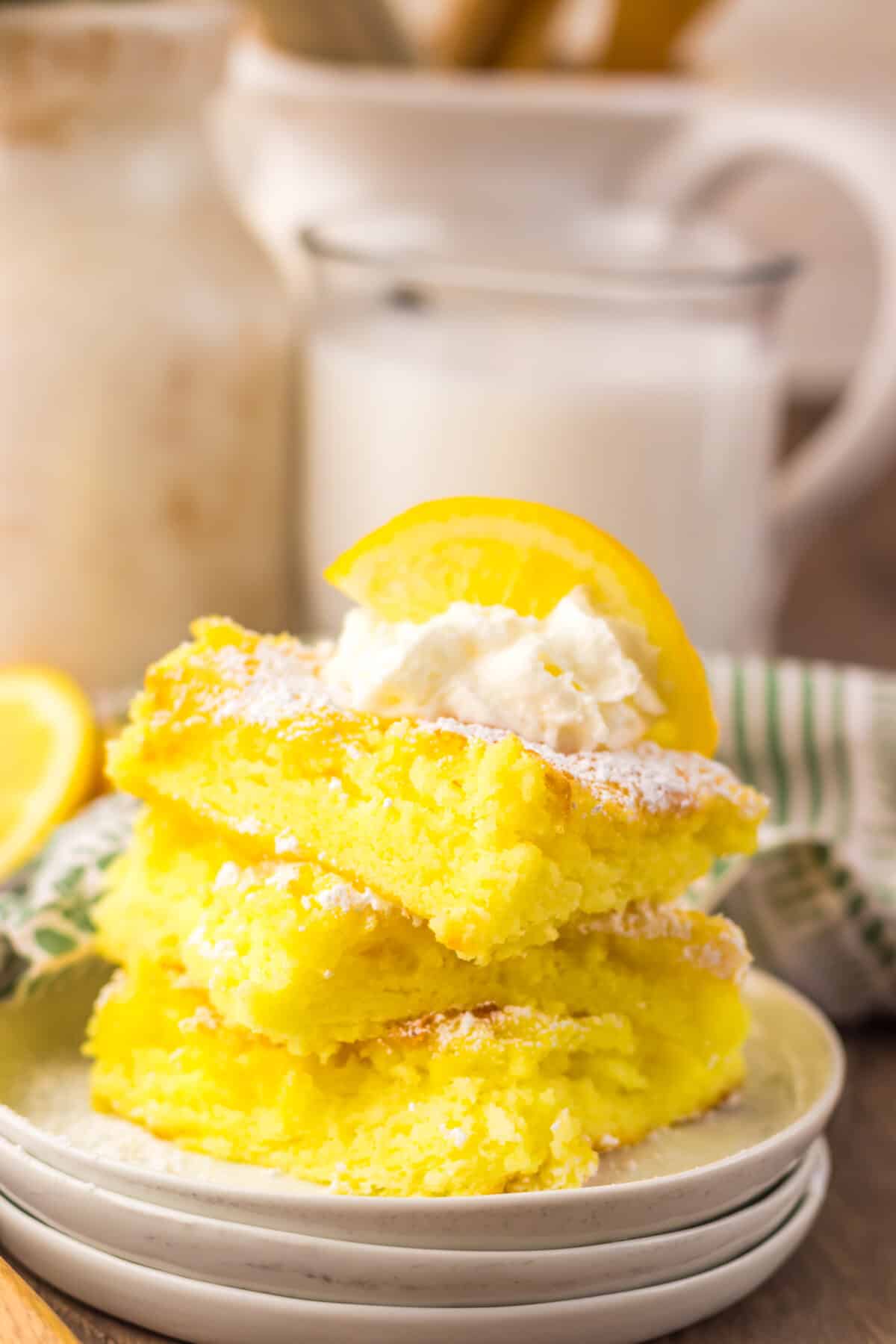 Stack of two ingredient lemon bars on a plate.
