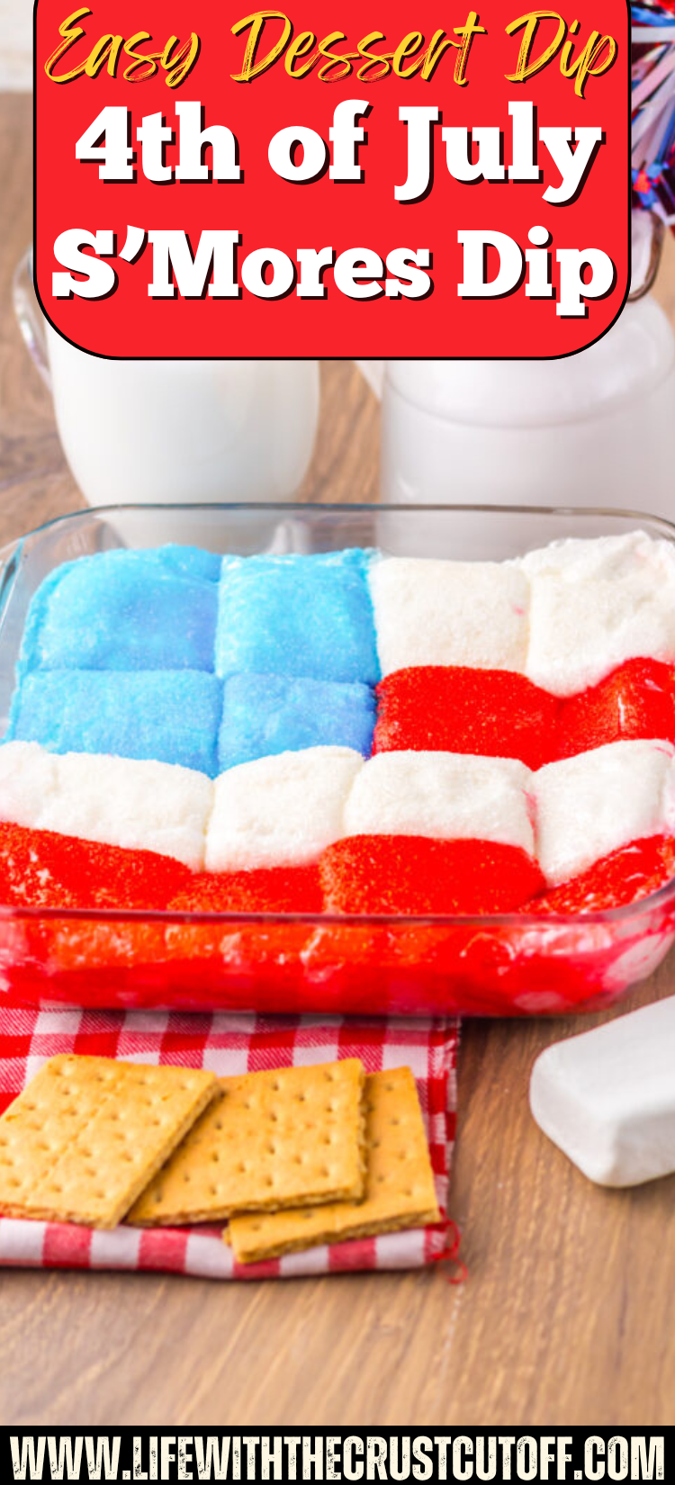 4th of July S'Mores Dip topped with patriotic red, white, and blue candies and served with graham crackers for dipping.