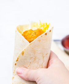 Crispy chicken strip wrapped in a flour tortilla with cheese.