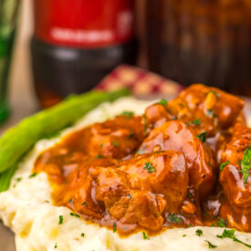 Slow Cooker Dr Pepper BBQ Rib Bites served hot with creamy mashed potatoes.