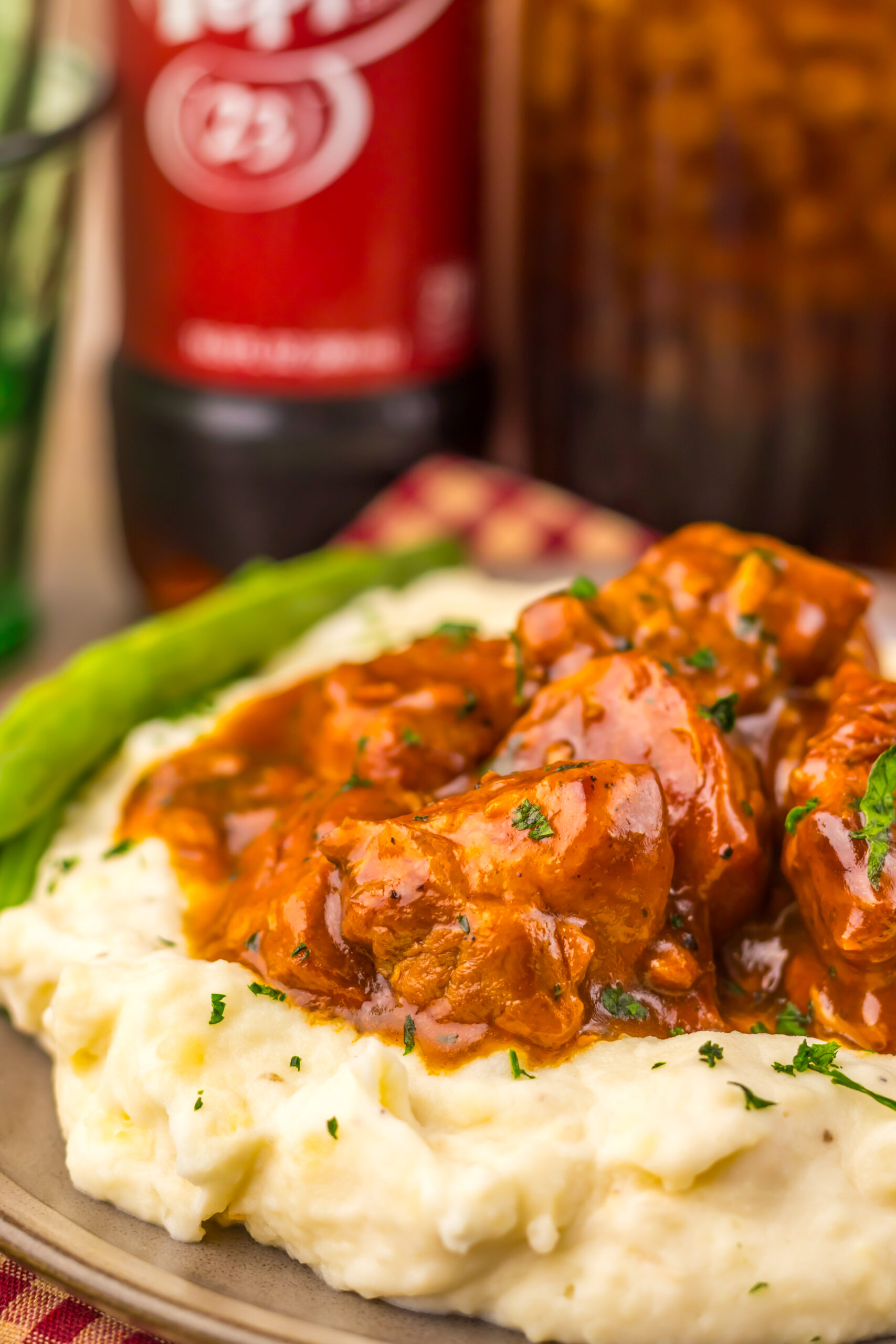 Slow Cooker Dr Pepper BBQ Rib Bites served hot with creamy mashed potatoes.