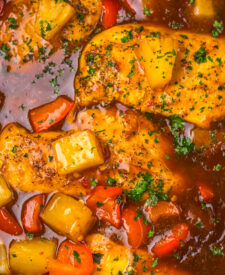 Sweet chili pineapple chicken simmering in the slow cooker.