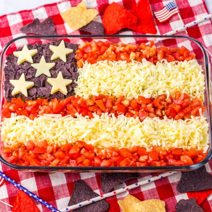 Festive Flag Taco Dip in a 9x13 dish for summer parties.