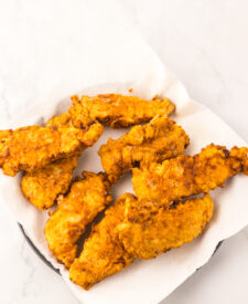 Breaded chicken tenders fried.
