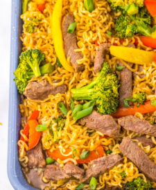 Close-up of baked Sheet Pan Beef Ramen with tender beef and vegetables.