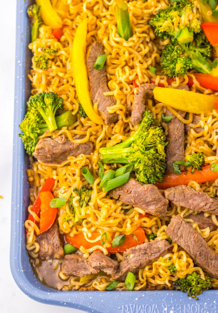 Close-up of baked Sheet Pan Beef Ramen with tender beef and vegetables.
