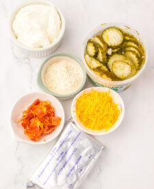 Ingredients for Viral Pickle Dip ready to be mixed together.