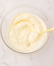 Cream cheese beaten until smooth for Viral Pickle Dip.