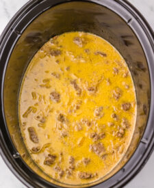 Creamy French onion sauce mixed before adding ravioli.