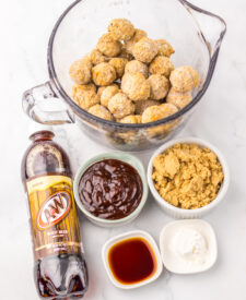 Ingredients for Slow Cooker Root Beer Meatballs including frozen meatballs, root beer, barbecue sauce, brown sugar, and Worcestershire sauce.