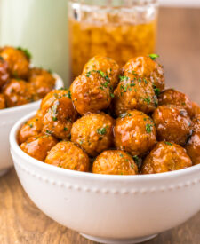 Close-up of tender Root Beer Meatballs coated in rich barbecue glaze.