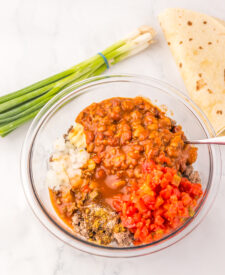 Seasoned ground beef mixture prepared for Slow Cooker Chili Cheese Enchilada Bake.