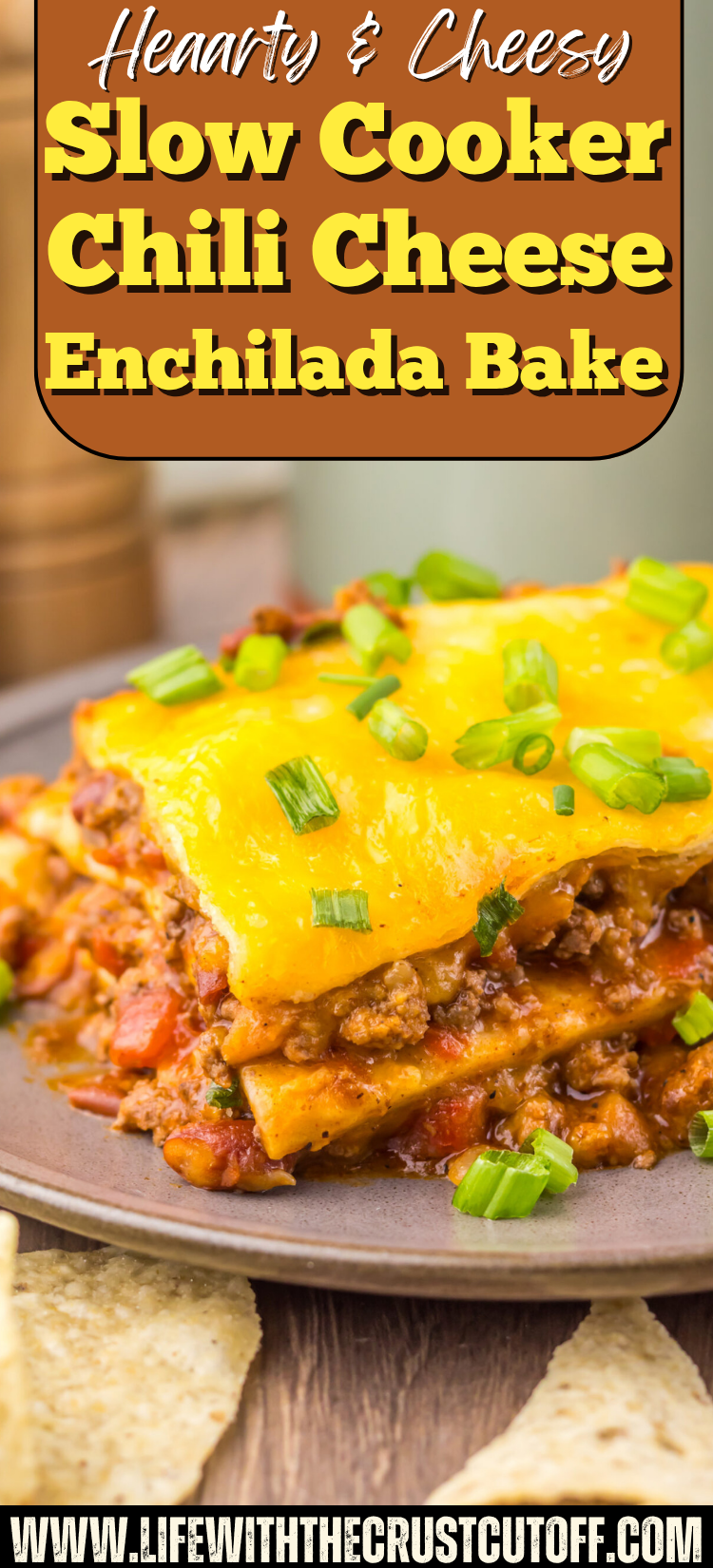 Slow Cooker Chili Cheese Enchilada Bake layered with tortillas, hearty chili, enchilada sauce, and plenty of melted cheese.