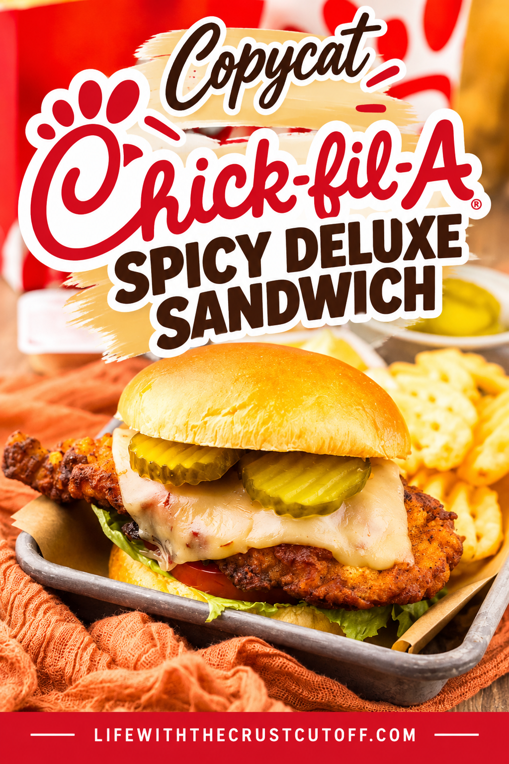 Copycat Chick-fil-A Spicy Deluxe Sandwich with crispy chicken, melted cheese, pickles, lettuce, and tomato served with waffle fries.