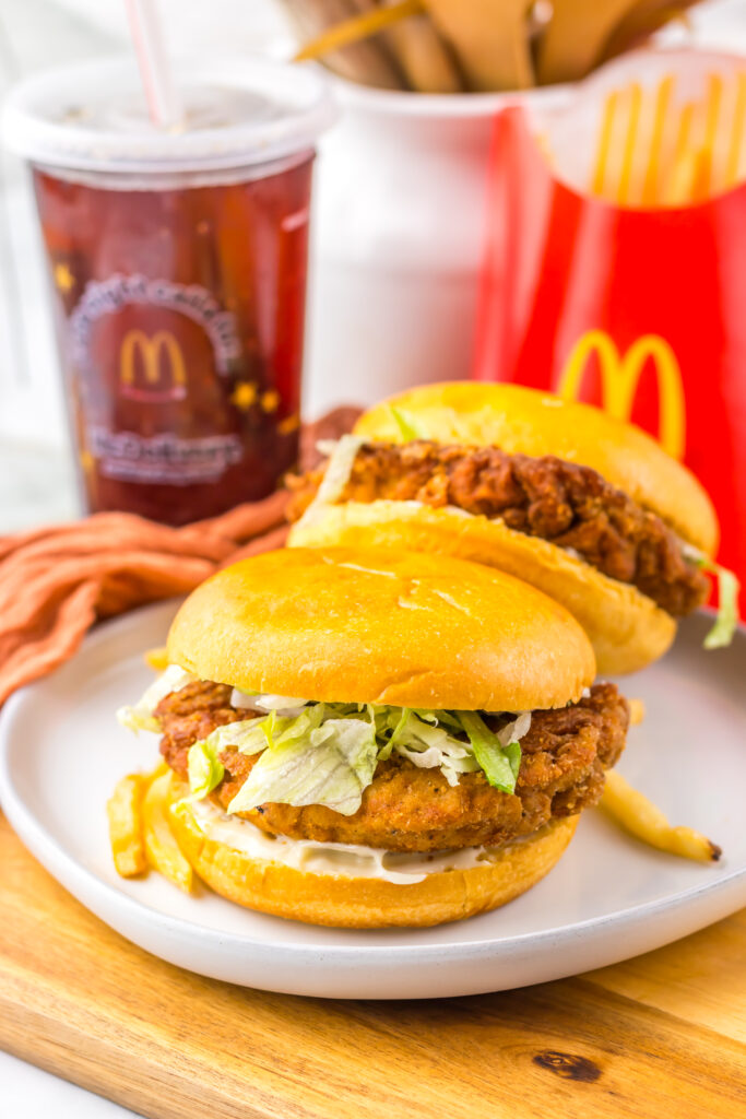Copycat McDonald’s Hot & Spicy Chicken Sandwich served with fries and a drink.