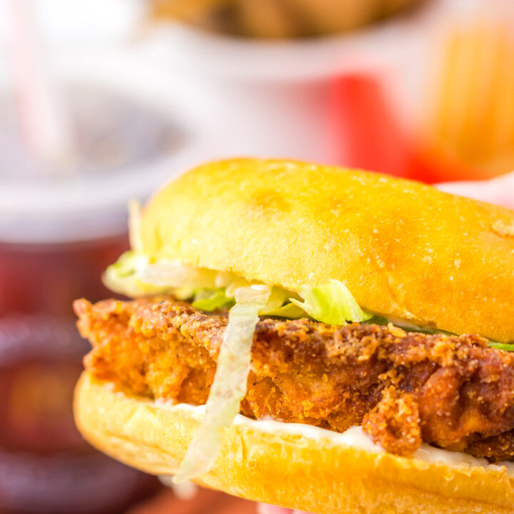 1. Close-up of the crispy spicy chicken patty and toppings on a McDonald’s Hot & Spicy Chicken Sandwich.